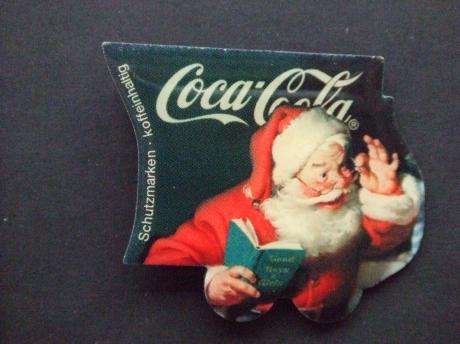 Coca Cola kerstman leest voor